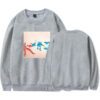 Soft gray sweatshirt featuring an abstract, colorful graphic print on front, casual and stylish sweatshirt for everyday wear and street fashion.