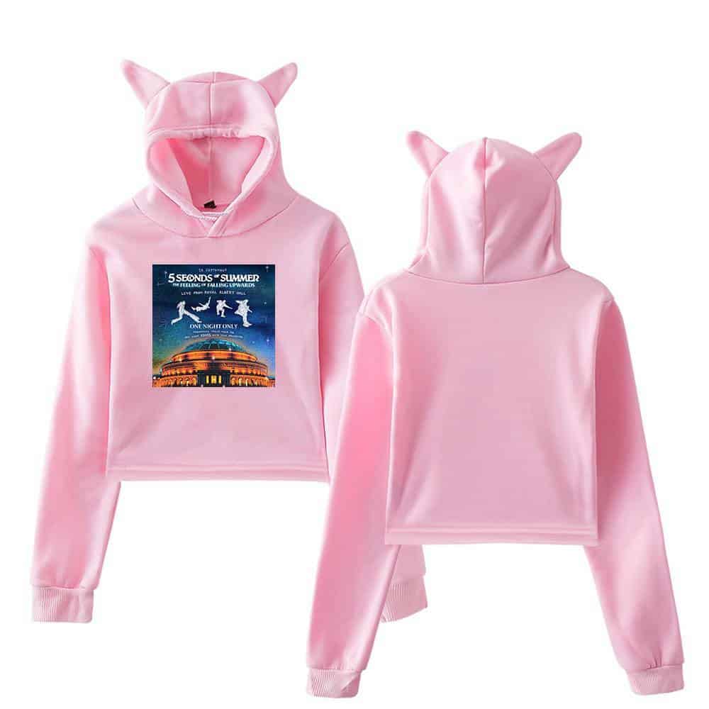 5 Seconds of Summer pink hoodie with cat ear hood and graphic print, perfect for fans or casual wear. Made from soft material, featuring a comfortable fit and stylish design. Ideal merchandise for pop band enthusiasts.