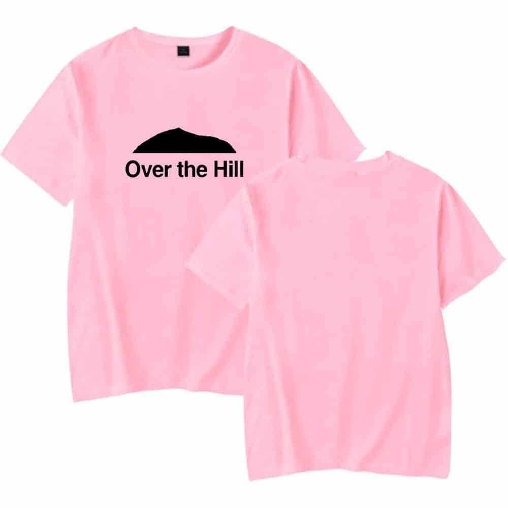 Over the Hill pink graphic T-shirt with black silhouette of a hill and the phrase "Over the Hill". Perfect for humorous gift or fun casual wear. Made of soft, comfortable fabric, suitable for all genders.